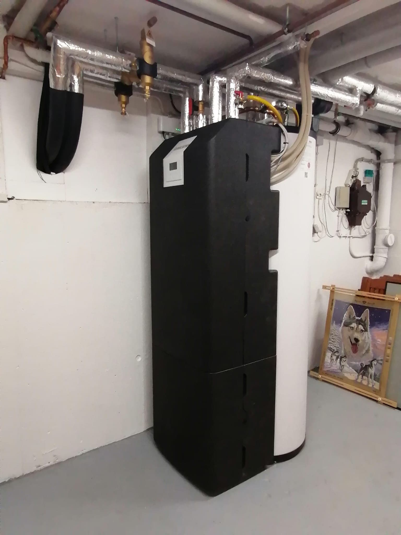 Wir haben eine alte Flüssiggasheizung gegen eine moderne Wärmepumpe austauschen lassen. Nun genießen - Bild 2